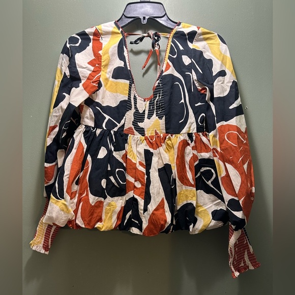 Abstract Print Blouse in Red, Black, and Yellow - Picture 10 of 10